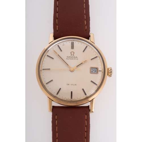 434 - Omega De Ville Automatic a 9ct gold gentleman's wristwatch the cream dial with raised baton numerals... 