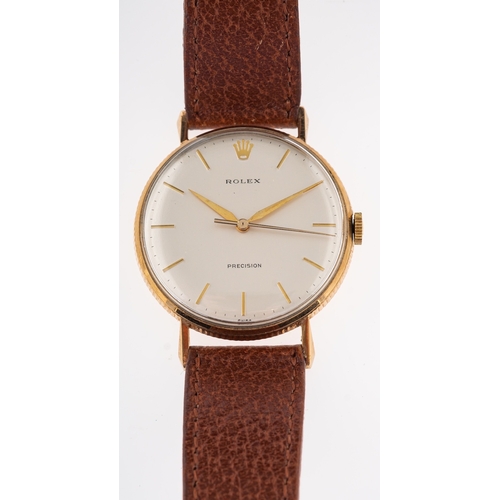 452 - Rolex a gentleman's gold wristwatch model 3012 the cream dial with raised baton numerals, baguette h... 