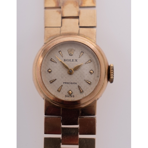 453 - Rolex a gold wristwatch the inside of the case hallmarked for 9ct gold, Chester 1956 and stamped R.W... 