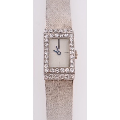 455 - A platinum and 18ct white gold and diamond ladies wrist watch the rectangular dial with baton quarte... 