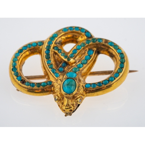 508 - A Victorian style snake brooch set with turquoise, small rose cut diamond set eyes,  in unmarked yel... 