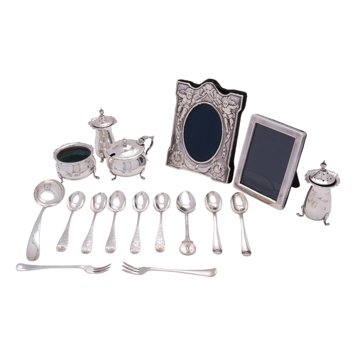 51 - An Edwardian silver baluster four piece cruet set by Constantine & Floyd Ltd, Birmingham 1903, with ... 