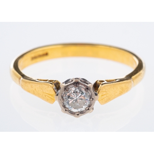 514 - A gold ring with single diamond in illusion setting, diamond estimated at 0.35 carat, 18ct gold moun... 