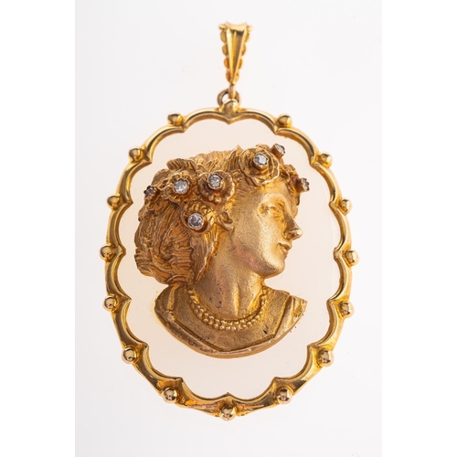 547 - A 1970s 9ct gold and diamond cameo pendant, the oval pendant with an applied female profile, her hai... 