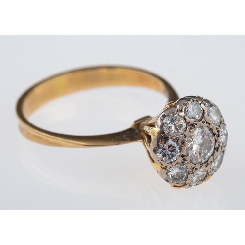 552 - A vintage 1970's diamond cluster ring,set with brilliant cut diamonds, total diamond weight estimate... 