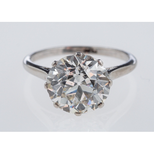 564 - A solitaire diamond ring, the transitional cut stone of around 3.12 carat in a platinum crown with h... 