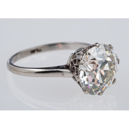 564 - A solitaire diamond ring, the transitional cut stone of around 3.12 carat in a platinum crown with h... 