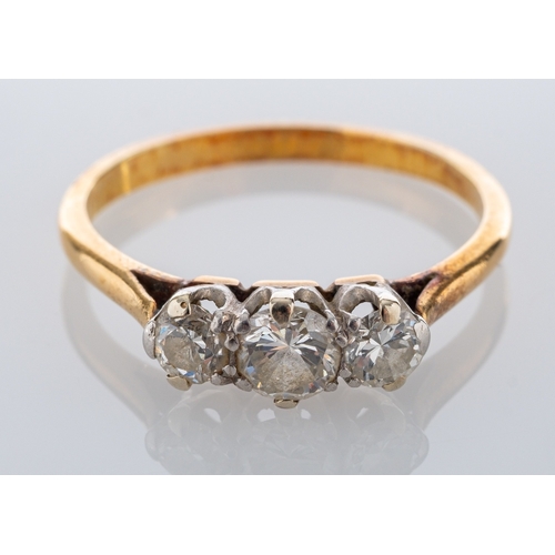 597 - A diamond three stone ring, set with three brilliant cut diamonds, approximately 0.50 carats total, ... 