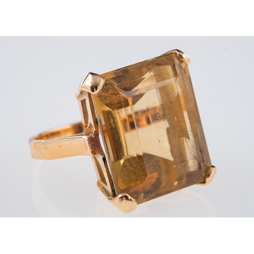 611 - A vintage dress ring set with a large smoky yellow citrine stone, ring size G, 14ct gold, gross weig... 