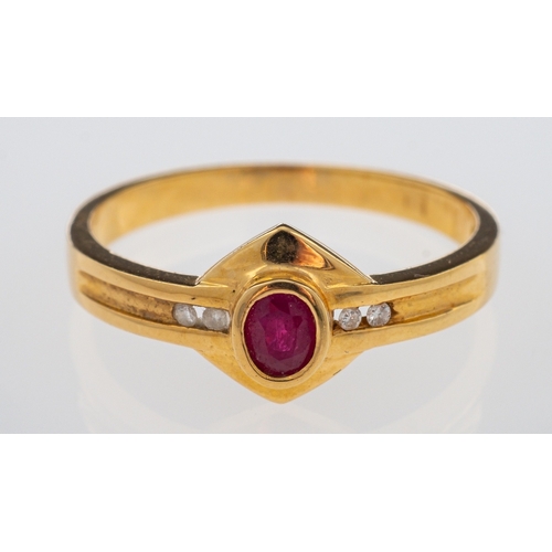 713 - A gold ring set with oval ruby and diamonds on a gold plaque setting, ring marked 750 for 18ct  gold... 