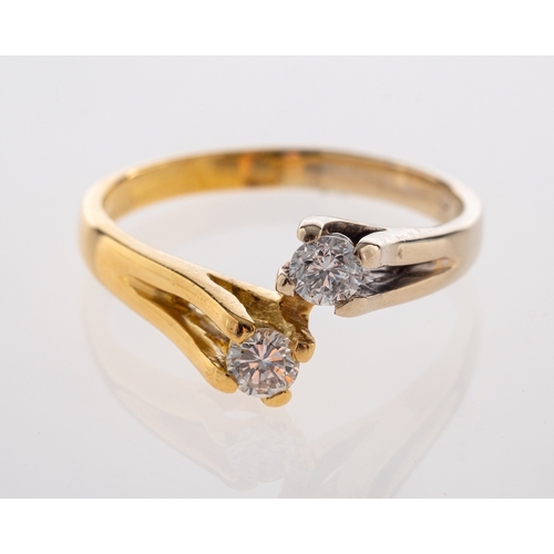 723 - A modern 18ct gold, diamond crossover ring, size M