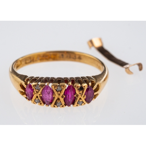 727 - A gold ring set with marquise form rubies and small diamonds, hallmarked 18ct, ring size O