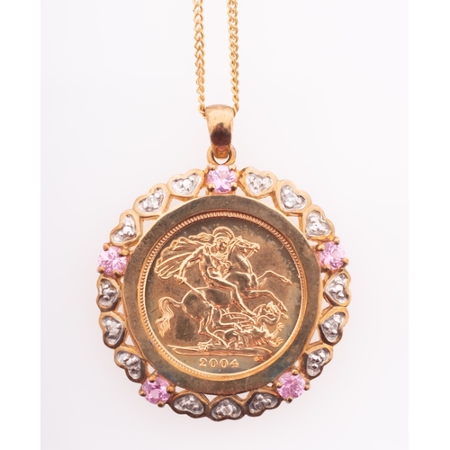 728 - An Elizabeth II half sovereign coin in gold mount with heart form diamond settings and pink sapphire... 