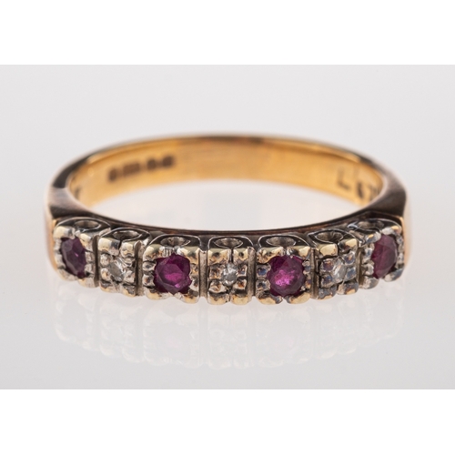 730 - A ruby and diamond ring, half set with circular cut rubies and eight cut diamonds, stamped 375 for 9... 