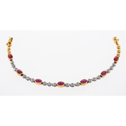 731 - A bracelet set with rubies & diamonds in 18ct white and yellow gold, length 18cm.