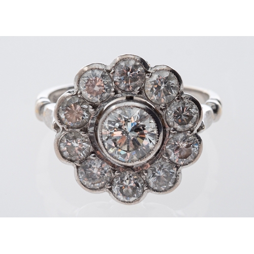 732 - A diamond daisy ring set in 18ct white gold,  estimated diamond weight centre stone, 0.85 carat, tot... 