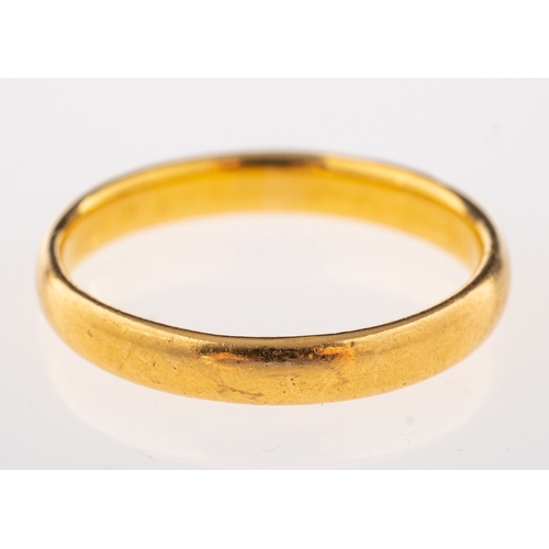 830 - A 22ct gold wedding band, stamped 22 with full London hallmarks, ring size M, 3.3g