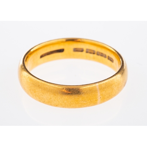 833 - A plain gold wedding band, 22ct, D form size Q, weight 8.4grams