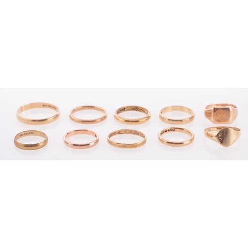 838 - A group of 9ct gold wedding bands, hallmarked and one yellow metal band, gross weight 27.4 grams