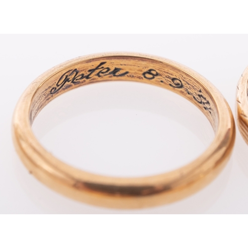 838 - A group of 9ct gold wedding bands, hallmarked and one yellow metal band, gross weight 27.4 grams