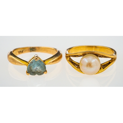 842 - A pearl ring set in 18ct gold and a  blue topaz ring unmarked, both ring size H