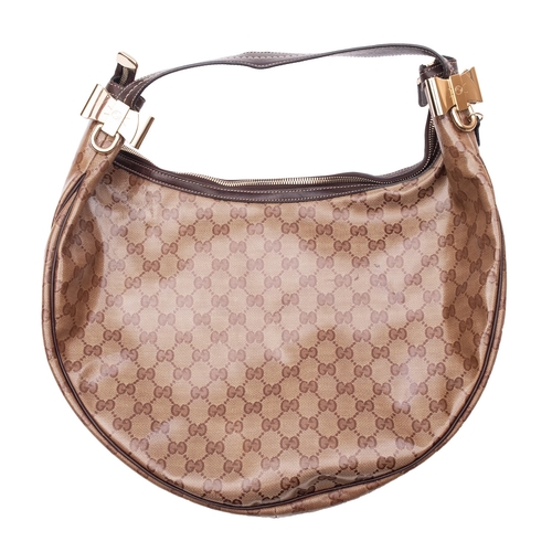 849 - Gucci, A brown leather and monogrammed canvas shoulder bag, gold tone hardware, serial number '18149... 