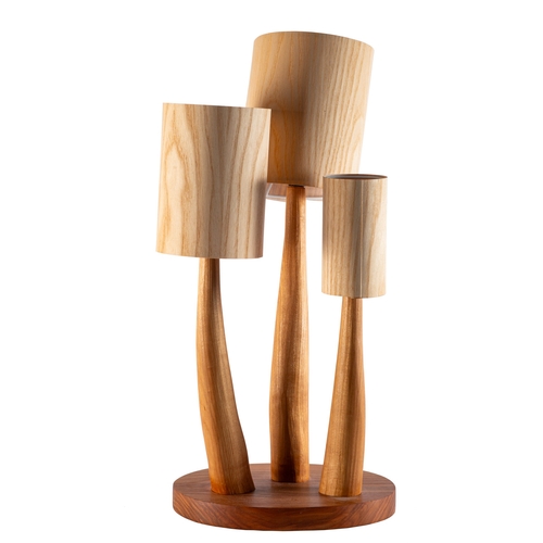 460 - Peter Lanyon [Contemporary] a chestnut triple stem table lamp with ash shades, 55cm high