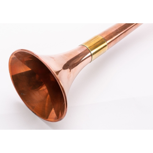 122 - A copper and brass bound coaching horn with trumpet horn, 89cm long