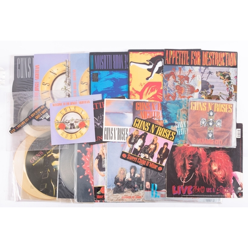 1406 - Guns N' Roses. A group of fourteen 12 inch singles and picture discs. 'Paradise City/ Used to Love H... 