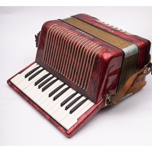 1407 - A Hohner Student II accordion, in red pearl finish, cased.