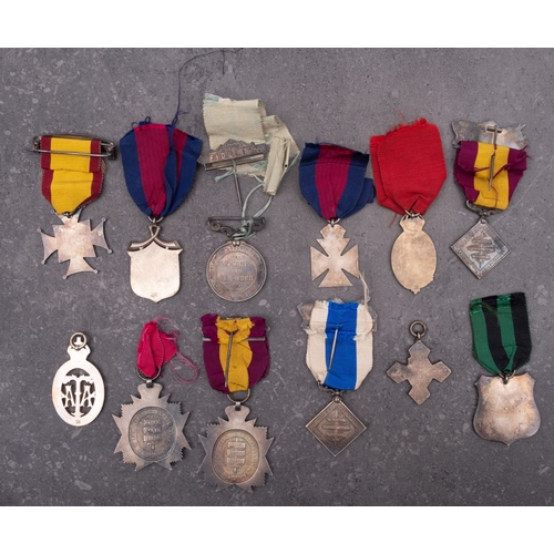 254 - A group of eleven Army Temperance Association medals, together with a Total Abstinence Medal (12)