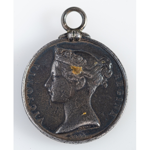 260 - A Crimea Medal to 'George Harwood 19th Regt', (poor condition, with replacement suspension)