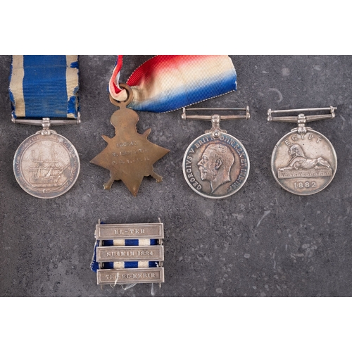 285 - An Egypt and WWI group of four, comprising of Egypt Medal with three clasps, Victorian Royal Naval L... 