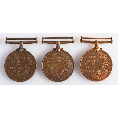 290 - A group of three special Constabulary Long Service medals, GRV to ERII, ' Geoffery A. Potter', ' Sct... 