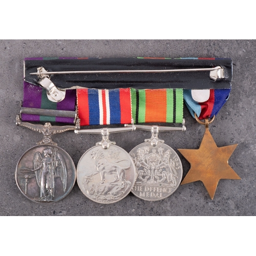 304 - A WWII group of four, 1939-45 Star, Defence Medal, War Medal, and General Service Medal with clasp, ... 