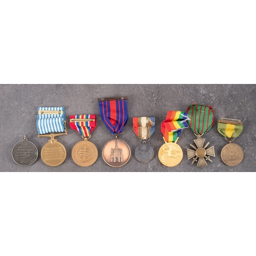 309 - An United Nations Korea Medal, together with a small collection of world medals.