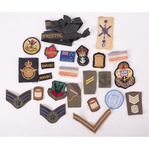 333 - A quantity of British and foreign cloth patches together with RN hat tallies etc (a lot)