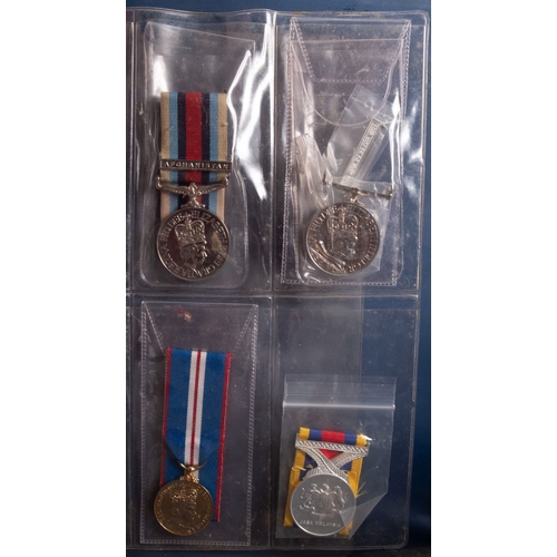 360 - A collection of reproduction medals in a Medal Album.