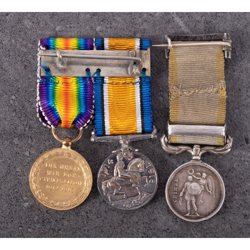 379 - A miniature Crimea Medal with Sebastapol clasp, together with a WWII miniature pair.