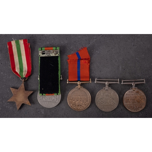 386 - Three WWII service medals, together with a George V Special Constabulary Long Service Medal ' Alfred... 