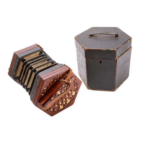 1402 - A twenty one button hexagonal concertina, probably Lachenal and Co, no. 113074, with mahogany fretwo... 