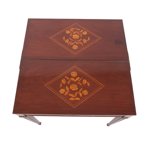 1094 - A Dutch marquetry inlaid walnut tea table, 19th century; the hinged rectangular top with stylised po... 