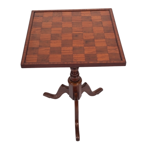 1100 - A William IV mahogany and satinwood games table, circa 1835; the square flip top with chequerboard w... 