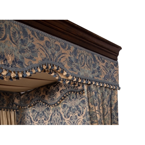 1123 - A mahogany and fabric adorned four-post bed, elements late 19th century and later adapted; with moul... 