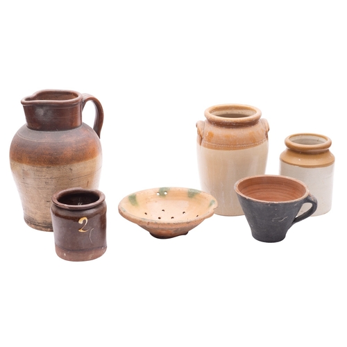 113 - A group of ten stoneware and other earthenware pots, storage jars and a large jug some part glazed, ... 