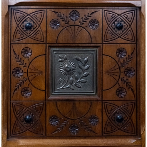 1149 - A Victorian oak and walnut wardrobe in Arts & Crafts style, late 19th century; with balustraded gall... 