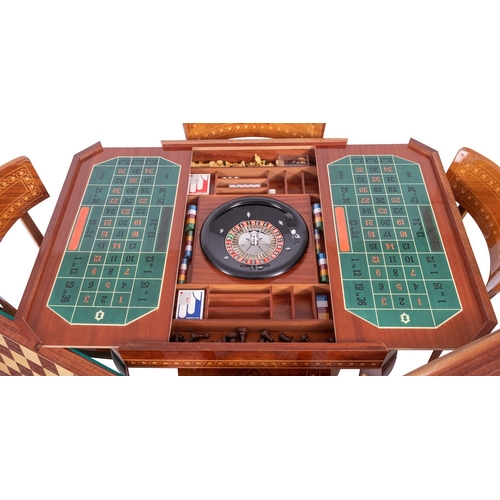 1190 - A Sorrentoware walnut and marquetry games table with four chairs en suite, 20th century; the square ... 