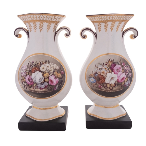 121 - A pair of Staffordshire pearlware vases of baluster quatrefoil form with scroll handles, each painte... 