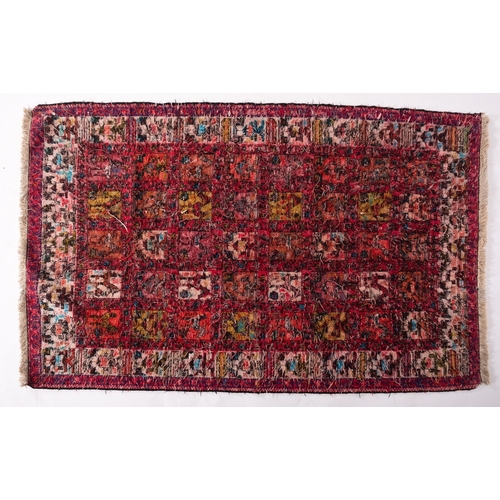 1298 - A Soumak park silk Kilim, the rose compartmented field with stylised birds and geometric designs, en... 