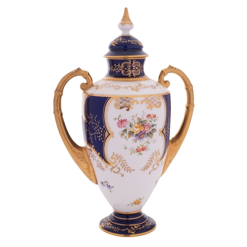 201 - A Coalport porcelain two-handled vase & cover painted with floral sprays and sprigs within gilded co... 